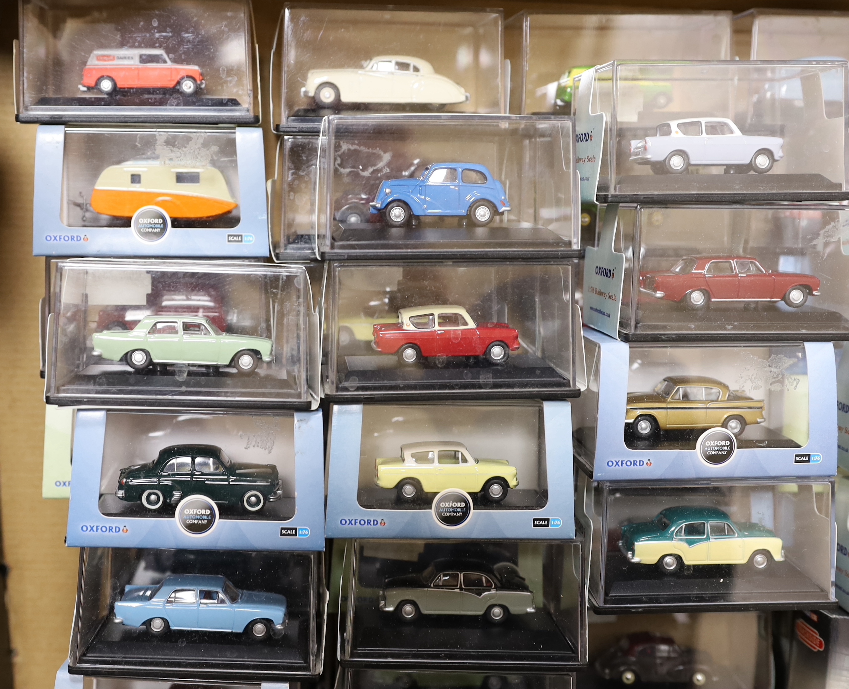 A collection of boxed 00 gauge 1:76 scale vehicles by Oxford Diecast and Corgi, including mainly 1950s/60s/70s cars and light commercial vehicles (54)